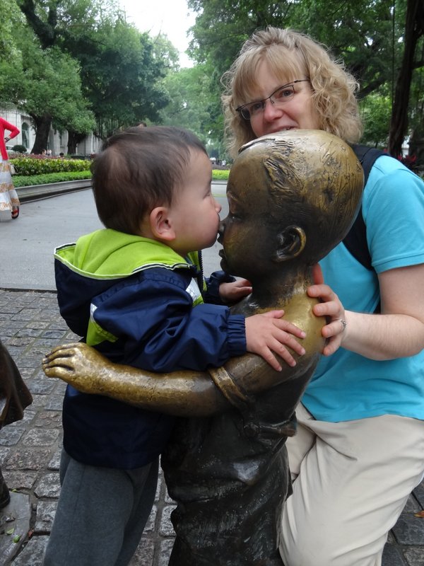 Max giving his friend a kiss good-bye